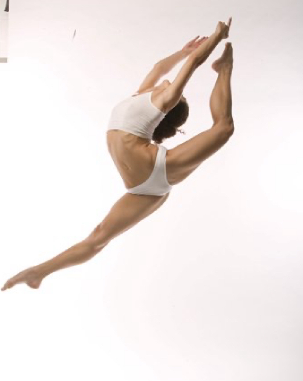 Dancer performing an airborne leap